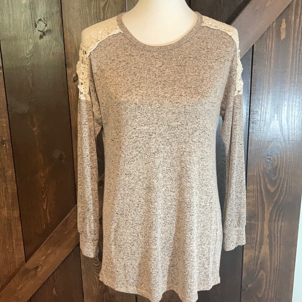 Boutique top with crochet lace cutout